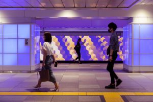 Digital Signage Installation "The Colour Bath" by Moment Factory Transforms World's Busiest Transit Hub into a Harmonious Environment