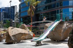 MIKE HEWSON SCULPTURAL WHEELED PLAYGROUND ENCOURAGES RISKY PLAY WITHIN A SECURED WORLD