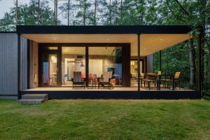 Dutch Creative Farm Concrete Produces "Center Parcs Cottage" Surrounded by Nature