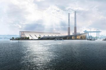 Long-distance view from the water, highlighting the museum’s relationship to the harbor and the city skyline beyond. Photo credit: LYT-X Studio